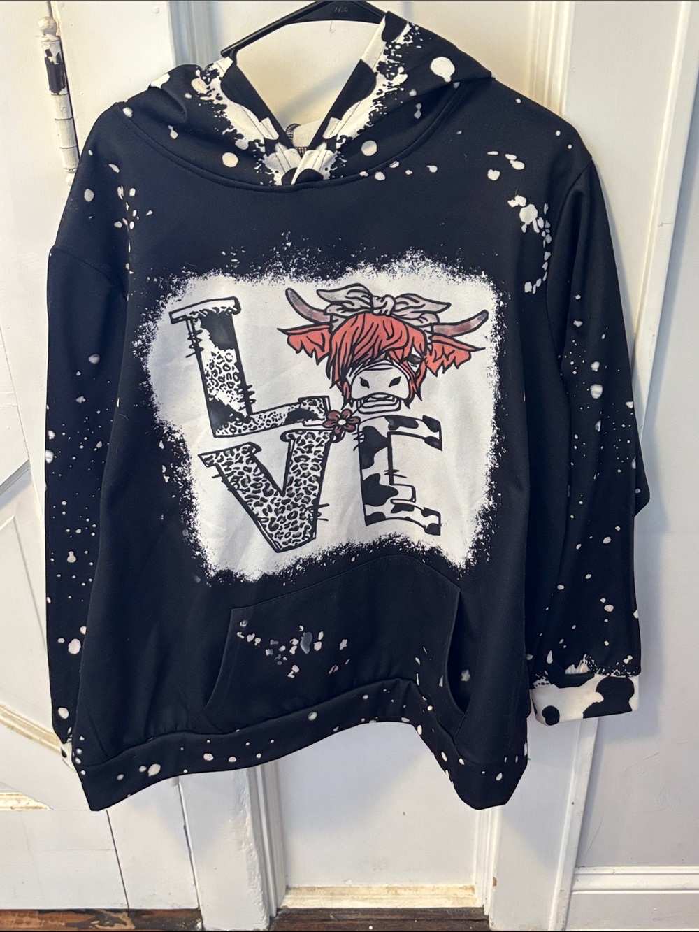 Woman’s 3xl Black Graphic Hoodie with Red Accent Cow Design from Temu.